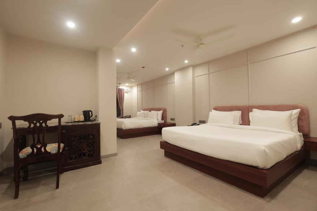 Family Four Bed Room interior view at Nirvana Boutique Hotel Ujjain