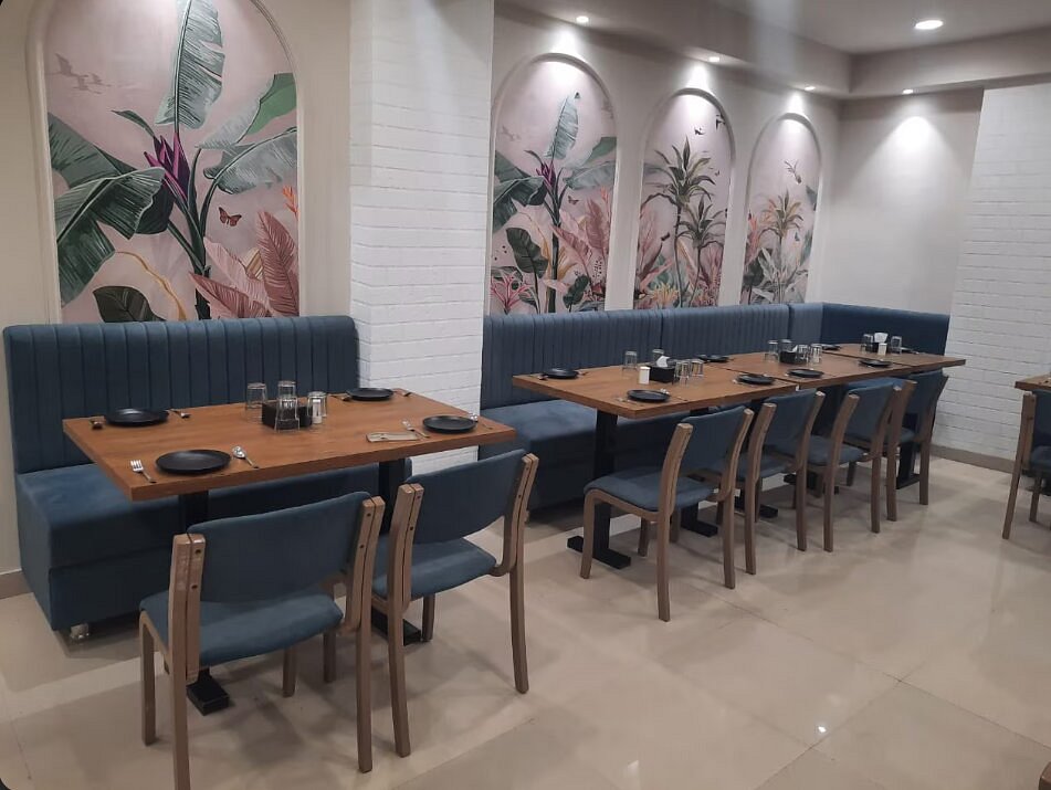 Restaurant at Nirvana Boutique Hotel Ujjain - Elegant dining area serving local and continental cuisine