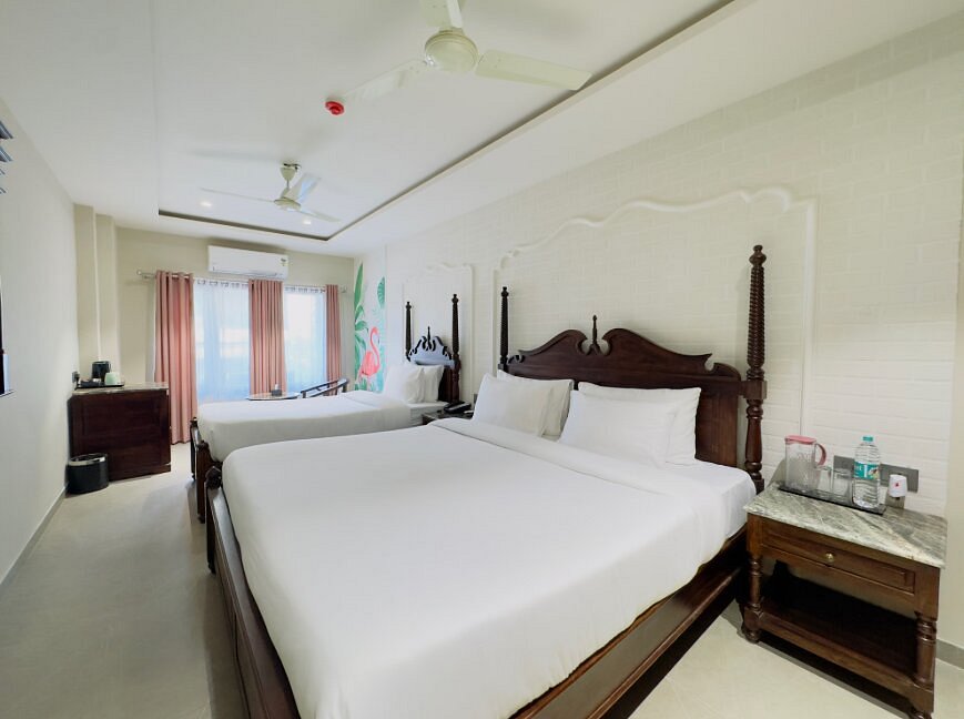 Superior Triple Room at Nirvana Boutique Hotel Ujjain - Family-friendly room with three beds