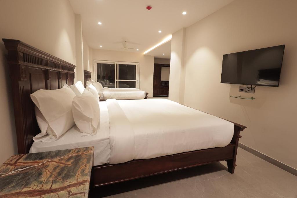 Superior Triple Room interior view at Nirvana Boutique Hotel Ujjain