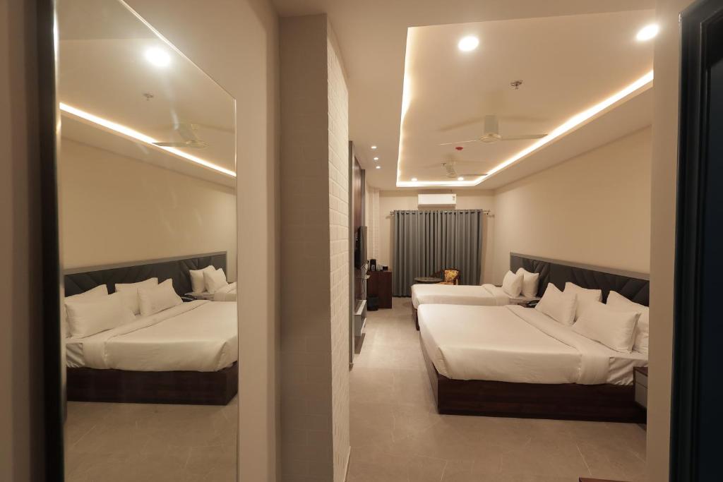 Superior Triple Room comfortable space at Nirvana Boutique Hotel Ujjain