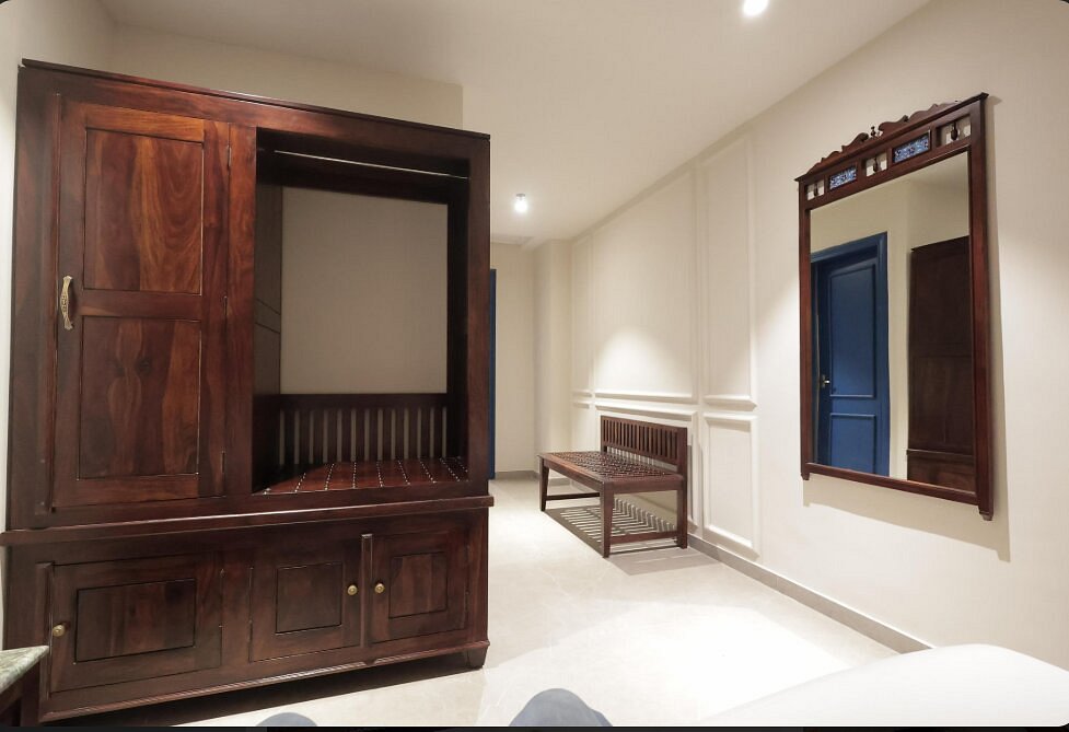 Executive Room wardrobe and storage at Nirvana Boutique Hotel Ujjain