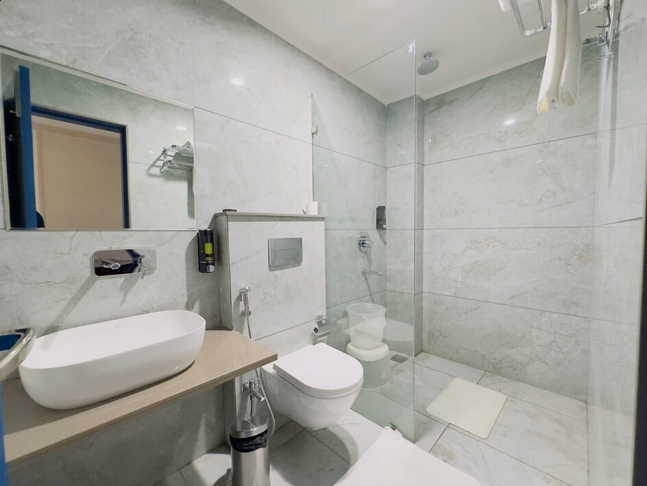 Superior Triple Room bathroom at Nirvana Boutique Hotel Ujjain